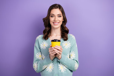 Portrait of smiling brunette wavy hair lady wear blue shirt holding no name brand paper coffee cup...