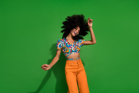 Portrait of chill girl young model carefree summertime vibes in nightclub with loud music dancing...