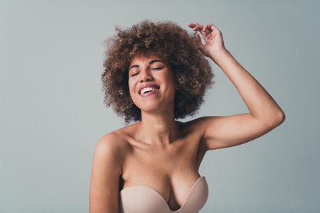Unretouched photo of smiling girl touch curls feel self confident about body hair imperfection