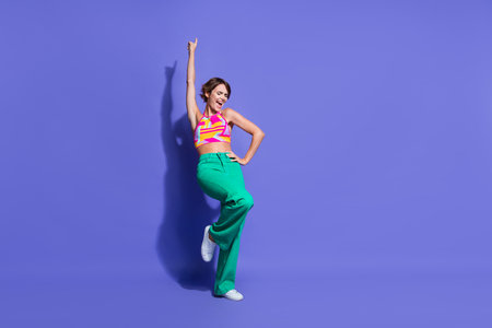 Photo of positive optimistic girl wear stylish clothes enjoy summer vacation disco club empty space...