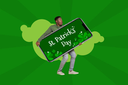 Composite trend artwork sketch image 3D photo collage of young amazed guy carry hold in hand huge smartphone green clover st patrick dayの写真素材