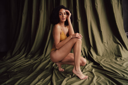 No retouch photo of stunning lovely nice girl love care accept imperfections over textile khaki color backgroundの写真素材