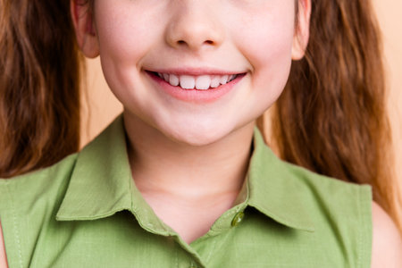 Cropped photo of kid girl toothy smiling advetise health teeth isolated pastel color background