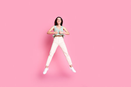 Photo of funny crazy pretty woman dressed stylish clothes thumb up isolated on pink color background