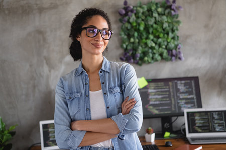 Photo of successful confident lovely girl website developer wear trendy denim shirt crossed arms...