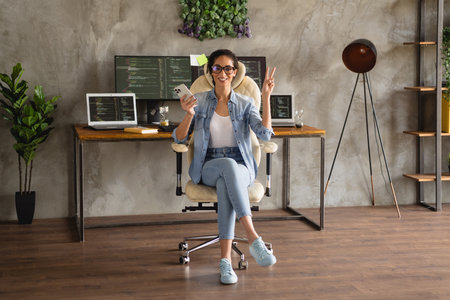 Photo of lovely successful girl wear stylish denim shirt work remote v-sign workspace workplace...