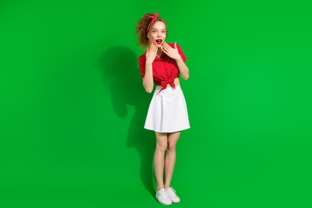 Full body photo of attractive young woman cover mouth shocked dressed stylish red retro clothes...