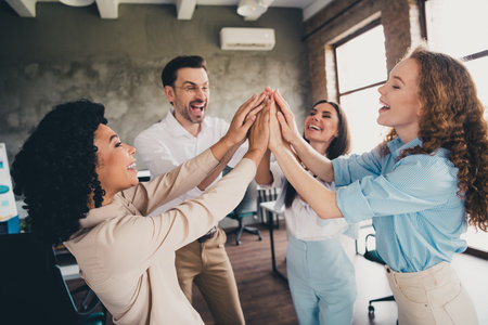 Photo of glad professional cheerful people hands touch achieve success complete work together...