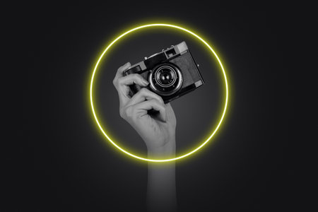Trend artwork sketch image photo collage of dark background neon light lamp tube circle shape hand hold photocamera shooting capture hobbyの写真素材