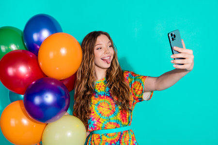 Photo portrait of pretty teen girl air balloons take selfie photo wear trendy colorful outfit...