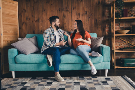 Photo of nice young charming people spending time together cozy lounge room loft interior indoorsの写真素材