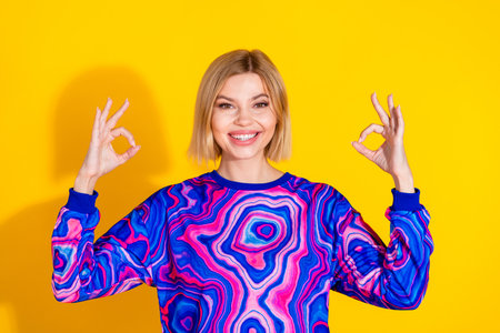 Photo portrait of lovely young lady show okey approve dressed stylish colorful blue garment isolated...