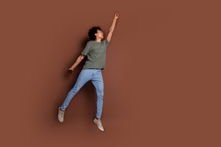 Full size photo of nice young guy hanging empty space wear trendy khaki outfit isolated on brown...