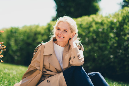 Photo of lovely cute dreamy glamour woman wearing trendy stylish outfit sunny spring day enjoying...