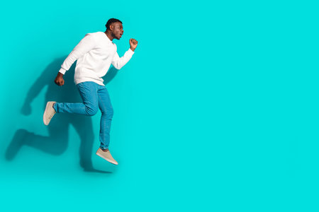 Full size photo of pretty young male running jump black friday wear trendy white outfit isolated on...