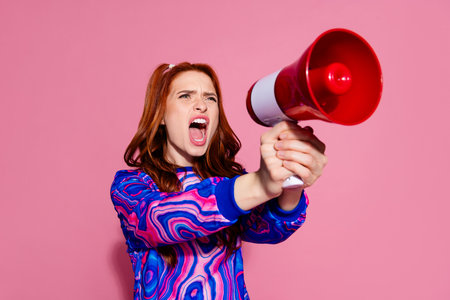 Photo of furious girl hold loudspeaker shout protest isolated pastel color background