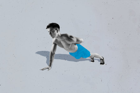 Creative poster collage of sportsman guy doing exercise on grey color backgroundの写真素材