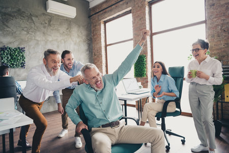 Photo of coworking project teamwork people ride armchair winning work together conference meeting...