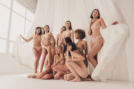 Full size portrait of no filter lovely peaceful model girls harmony all body type unique silky curtain studioの写真素材