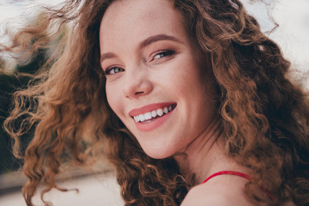 Photo of pretty sweet woman look camera charming girlfriend dressed red shirt outdoors urban modern townの写真素材