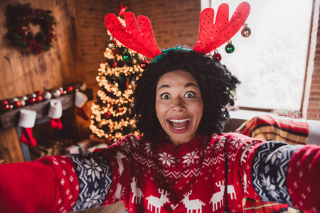 Photo of nice young girl amazed take selfie photo wear red christmas clothes enjoy modern cozy x-mas...