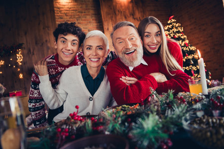 Photo of peaceful family cuddle toothy smile celebrate festive christmas time apartment indoors