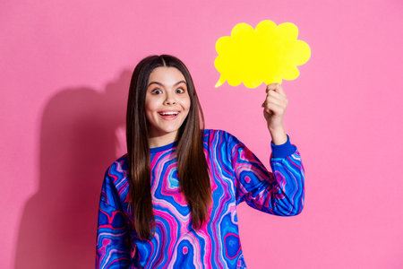 Photo portrait of lovely young lady hold paper cloud dressed stylish colorful garment isolated on...