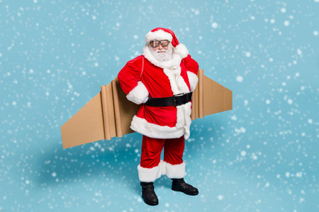 Full length body size view of his he nice fat cool content bearded Santa wearing plane wings warm...