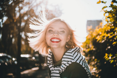 Photo of attractive young cheerful lady fluttering hair smile wear khaki garment tied shoulders...