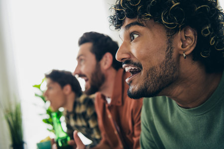 Cropped profile portrait of three best friends watch tv gather chill free time modern interior flat...