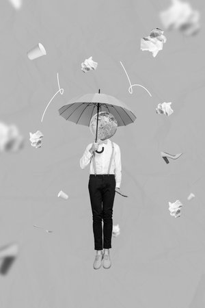 Collage photo concept of young gentleman costume guy hold yellow umbrella protect head planet falling down paper trash isolated on blue backgroundの写真素材