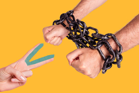 Composite photo collage of hands wear metal chain bracelet captive cut scissors open freedom imprisonment isolated on painted backgroundの写真素材