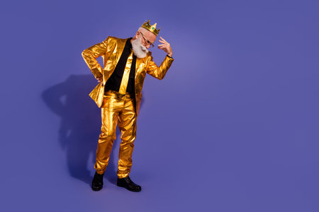 Full size photo of old macho man minded worried stressed dressed glamour stylish golden outfit party isolated on purple color backgroundの写真素材