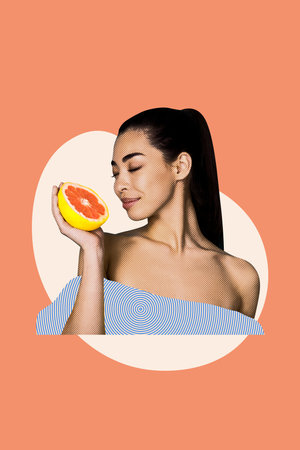 Vertical photo collage of happy girl sniff grapefruit half citrus piece detox juice vitamin diet nutrition isolated on painted backgroundの写真素材