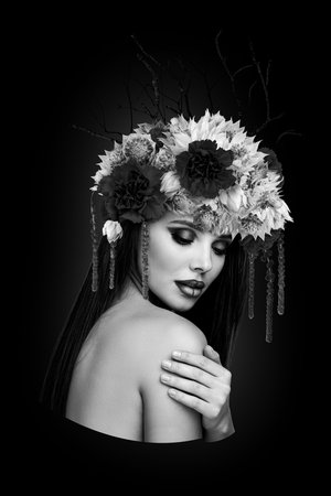 Creative mysterious collage of dark forest floral queen hugging herself have flower wreath beauty procedureの写真素材