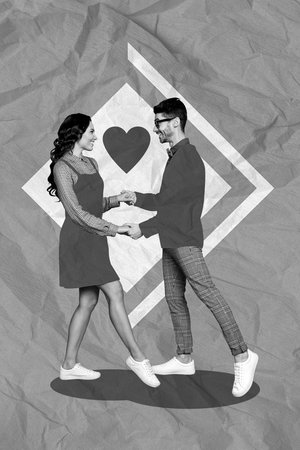 Vertical collage image of two positive lovers people black white colors hold arms dancing have good mood drawing heartの写真素材