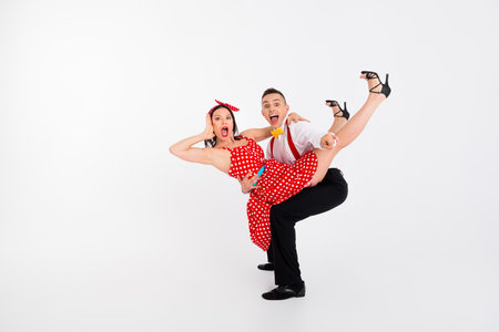 Full body photo of two partners dancing hands hold point finger you isolated on white color backgroundの写真素材
