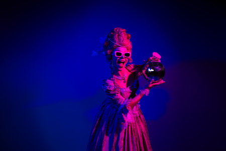 Photo of charming cheerful cool woman dressed in medieval queen gown theme party isolated on neon...