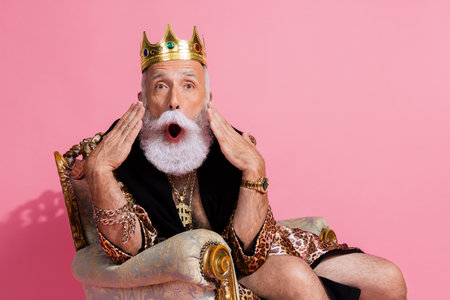 Photo of crazy funky poker gamer wear trendy leopard print bathrobe shocked win lottery luck success isolated on pink color backgroundの写真素材