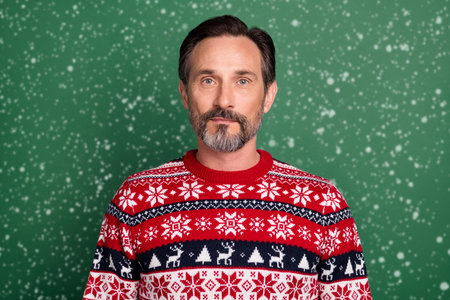 Photo portrait bearded man wearing sweater serious confident in winter isolated pastel green color backgroundの写真素材
