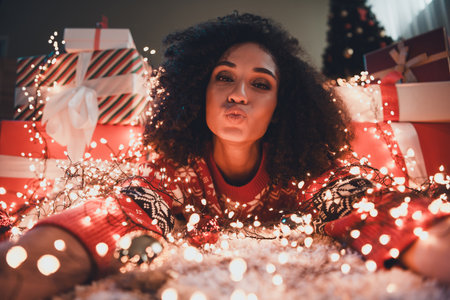Photo of nice young girl kissing take selfie photo wear ornament clothes enjoy cozy christmas decoration interior flat indoorsの写真素材