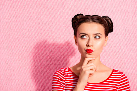 Close up photo beautiful she her lady pretty two buns pomade lips hold hand arm chin look up empty...