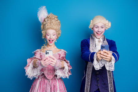 A joyful couple against a vibrant blue background, blending elements of classic baroque style with...