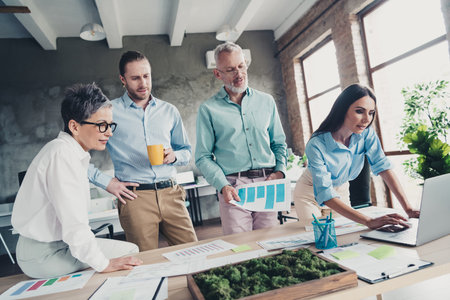 Photo of teamwork people working together confident brainstorming comfortable modern office loft...