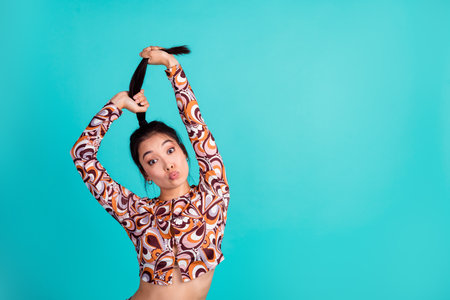 Photo portrait of pretty young girl pull ponytail hairstyle amazed wear stylish colorful clothes...