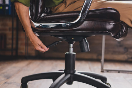 Photo of lady chief sit regulate chair workplace workstation loft interior indoorsの写真素材