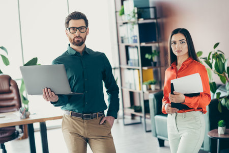 Professionals Collaborating in a Modern Workspace Highlighting Teamwork and Business Strategy for a...