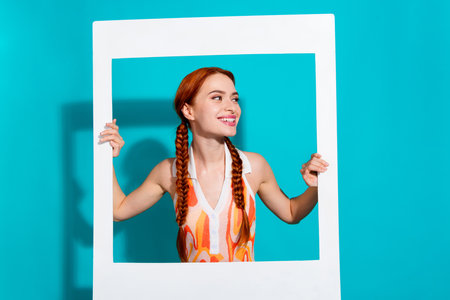 Photo of pretty young girl album card look empty space wear dress isolated on teal color background
