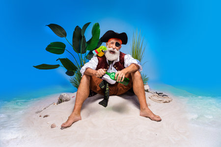 Bearded elderly pirate captain in exotic costume enjoying a beachside holiday adventureの写真素材