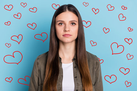 Portrait of successful lady executive chief look in camera isolated over sky light color backgroundの写真素材